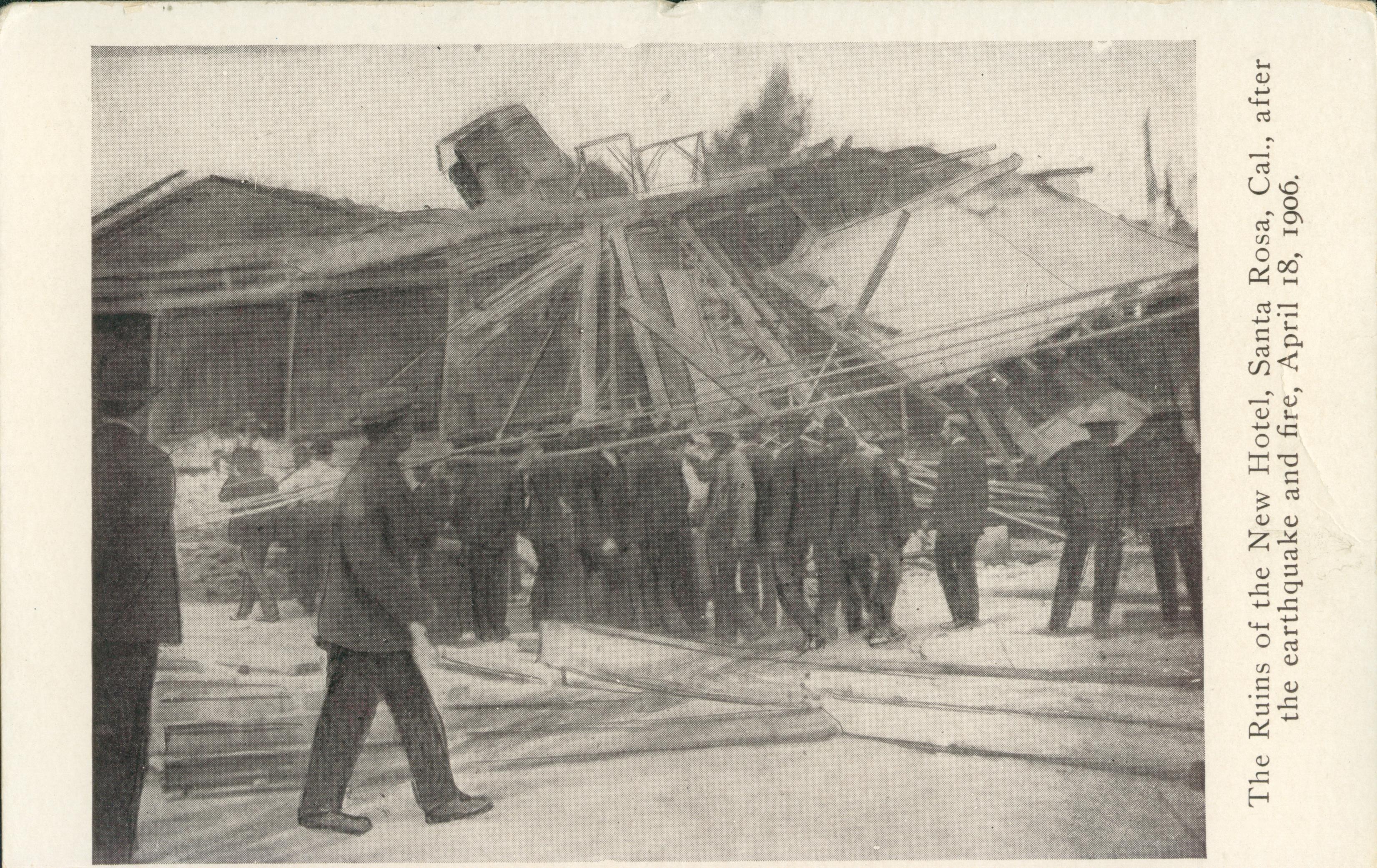 Show several men trying to lift a portion of the hotel, after the San Francisco Earthquake